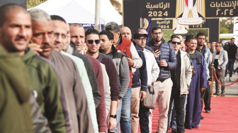 جانب من مشاركة المواطنين في التصويت بالانتخابات الرئاسية السابقة