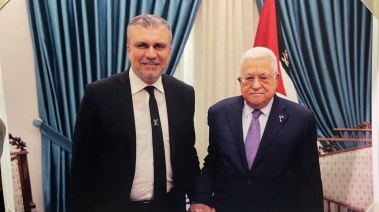 الإعلامي عمرو الليثي والرئيس الفلسطيني محمود عباس