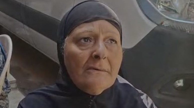 سيدة من سكان عمارة فيصل المحترقة