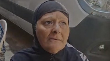 سيدة من سكان عمارة فيصل المحترقة
