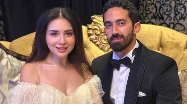 مي عز الدين وزوجها