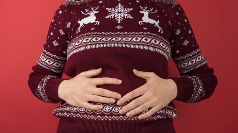 انتفاخ المعدة بعد تناول الطعام - تعبيرية 