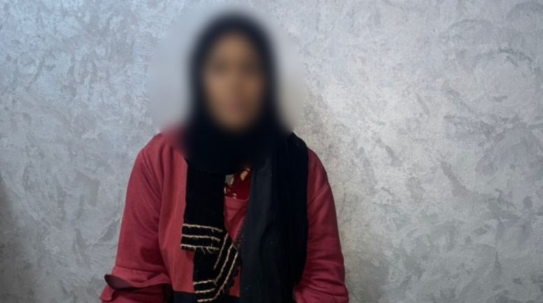 ضبط سيدة تقوم بجمع بطاقات الرقم القومى