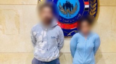 المتهمان بعد ضبطهما 