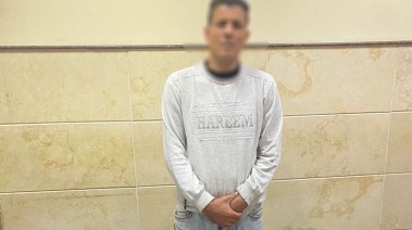 المتهم بعد ضبطه 