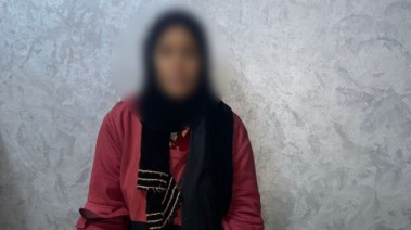 ضبط سيدة تقوم بجمع بطاقات الرقم القومى