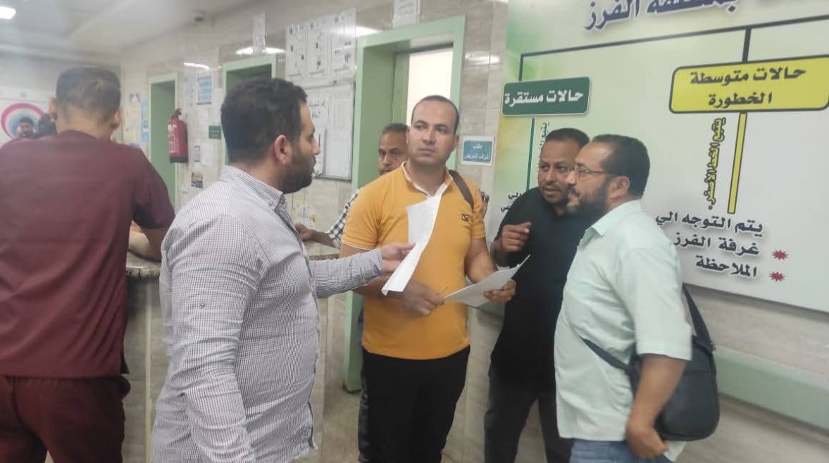 فريق من الصحة داخل المستشفى فريق من الصحة داخل المستشفى