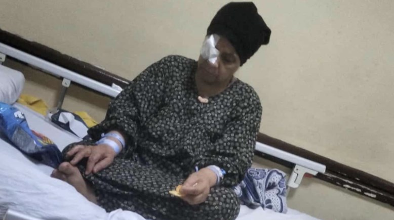 إحدى الضحايا بإصابات في العيون بمستشفى 6 أكتوبر