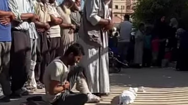 أب في جنازة أبنه