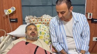 طارق علام والشاب شهاب عبد العزيز