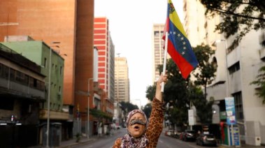 متظاهرة فنزويلية ضد الهجوم الأمريكي،  كاراكاس