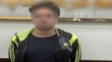 المتهم بعد ضبطه 