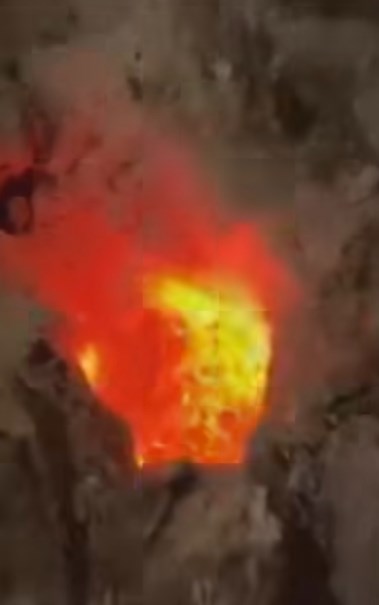 نار مشتعلة داخل قبر بالعراق