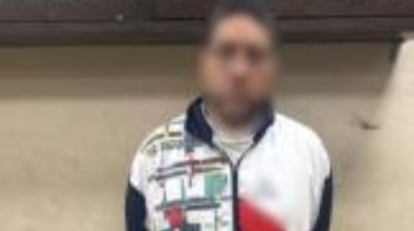 المتهم بعد ضبطه 