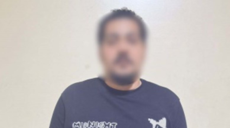 المتهم بعد ضبطه 