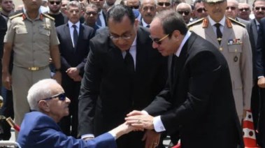 الرئيس السيسي ومدبولي ووالده