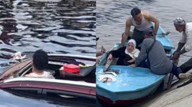 لحظة إنقاذ السيدتين بعد سقوطهما في ترعة