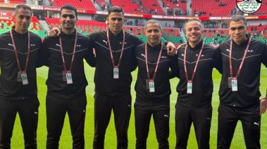 أمين عمر وطاقم والتحكيم