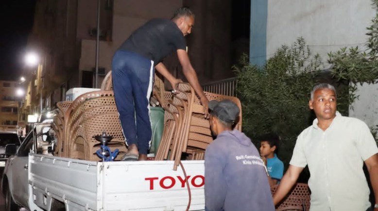 رفع 238 حالة إشغال وتعديات على الطريق العام باسوان 