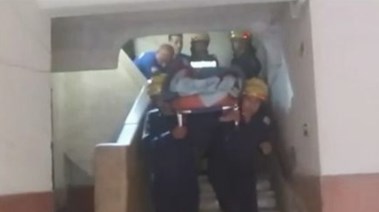 أمن الجيزة ينقل مُسنة للمستشفى
