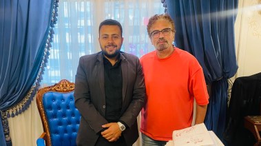 الرسام عمرو أمين والمستشار مؤمن عز الدين