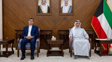  نائب وزير الخارجية الكويتي حمد سليمان وحامد حميد، القائم بالأعمال في السفارة الإيرانية
