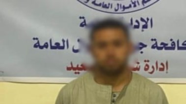 المتهم بعد ضبطه 