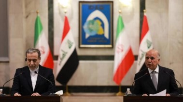 وزير الخارجية العراقي فؤاد حسين ونظيره الإيراني عباس عراقجي