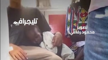 الطفلة السودانية التي نامت في حضن الشاب المصري