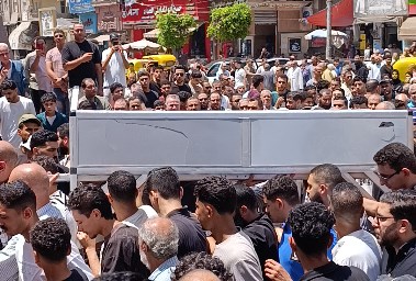 خلال تشييع الجثمان