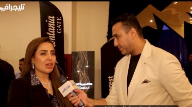 الإعلامي تامر مجدي والمذيعة منى العمدة 