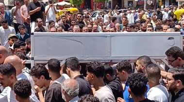 خلال تشييع الجثمان