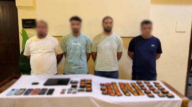 المتهمين بعد ضبطهم 