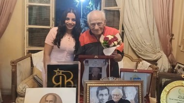 الفنان رشوان توفيق مع الزميلة هايدي محمد