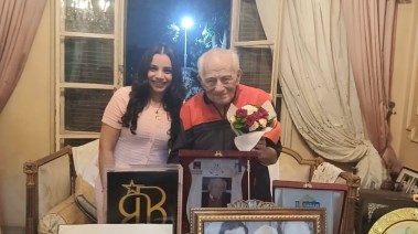 الفنان رشوان توفيق مع الزميلة هايدي محمد