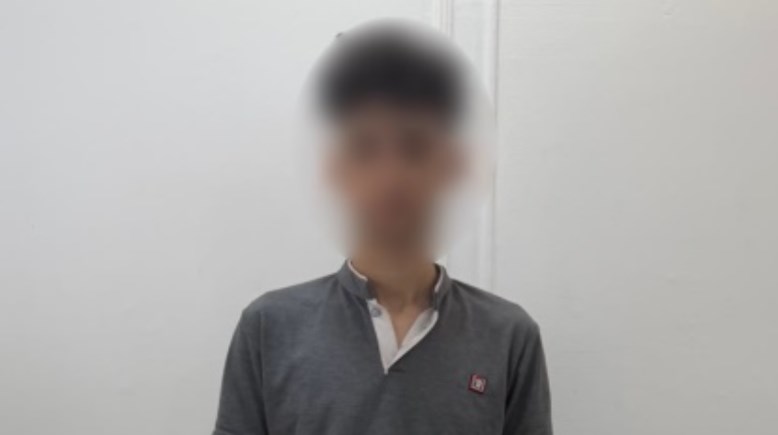 المتهم بعد ضبطه 