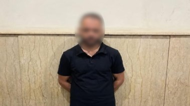 المتهم بعد ضبطه 