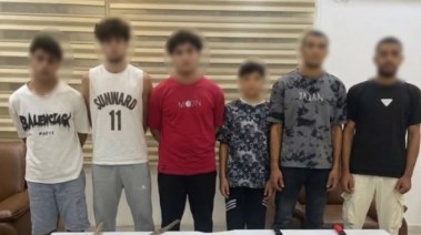 المتهمين بعد ضبطهم 